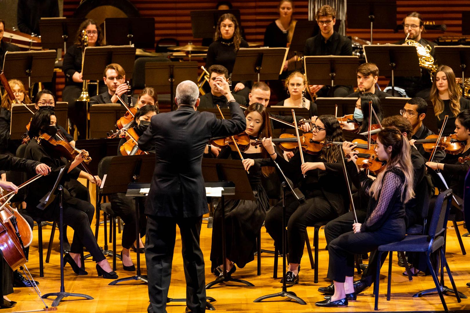 conductor with an orchestra