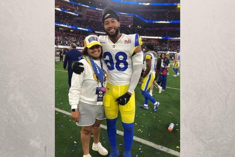 Kendall Blanton poses with sister Kelsey after Superbowl 56.